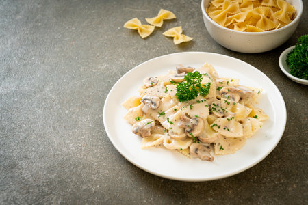 farfalle pasta with mushroom white cream sauce - Italian food styleの写真素材