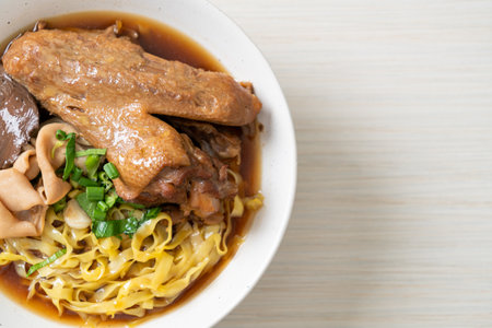 egg noodles with stewed and braised duck in brown soup - Asian food styleの写真素材