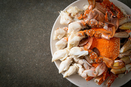 Steamed blue crab with spicy seafood sauceの写真素材