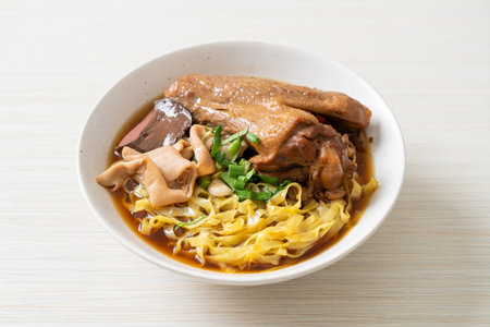 egg noodles with stewed and braised duck in brown soup - Asian food styleの写真素材