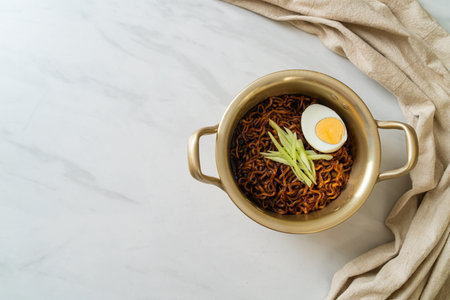 Korean Instant Noodle with Black Bean Sauce topped cucumber and boiled egg (Jajangmyeon or JJajangmyeon) - Korean food styleの写真素材