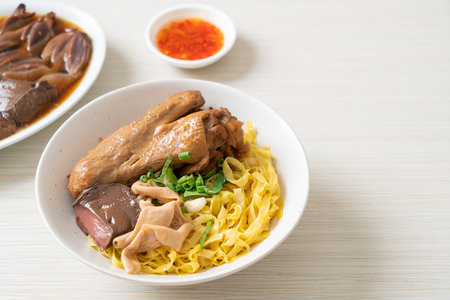 Egg noodles served dry with braised duck  - Asian food styleの写真素材