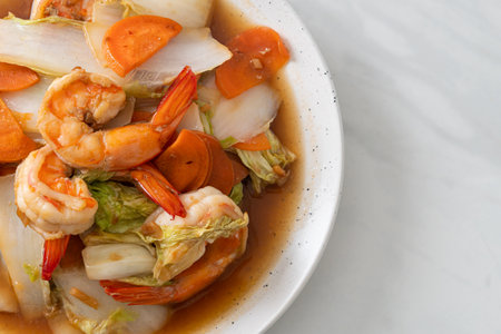 stir-fried Chinese cabbage with shrimps on plateの写真素材
