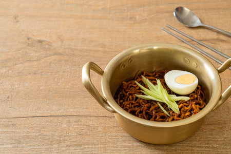 Korean Instant Noodle with Black Bean Sauce topped cucumber and boiled egg (Jajangmyeon or JJajangmyeon) - Korean food styleの写真素材