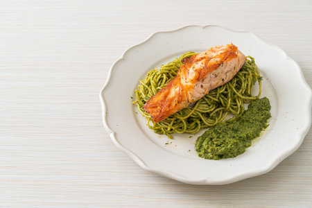 Spaghetti pesto with grilled salmon - Italian food styleの写真素材