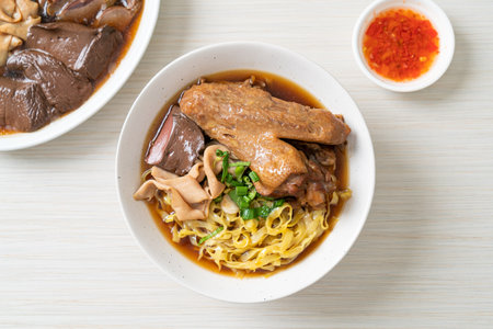 egg noodles with stewed and braised duck in brown soup - Asian food styleの写真素材