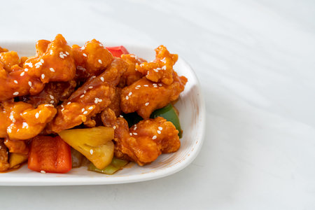 fried crispy chicken with sweet and sour sauce in Korean styleの写真素材