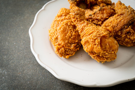 fried chicken with ketchup on plateの写真素材