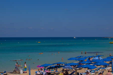 Protaras beach, Cyprus June 19, 2015. People relax at Protars beach in Cyprus.のeditorial素材