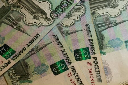 One thousand rouble notes. The Russian bank notes, denominations, roubles; background.