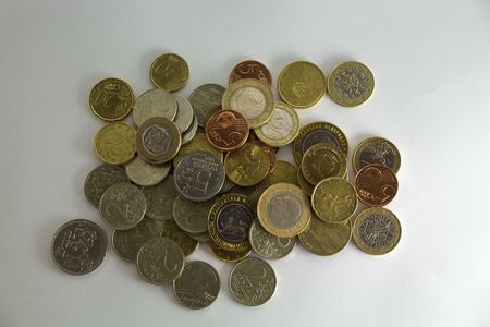 Pile of different coins from various countries