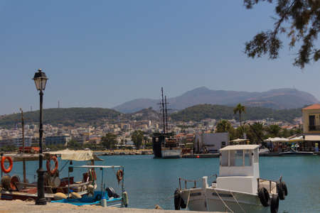 Rethymno, Greece - July  30, 2016: Boats in the Venetian harbour. The Venetian Harbor of Rethymnon, next to the modern harbor of the city, with the Egyptian lighthouse is one of the most picturesque areas of the old town. It operated in the Byzantine periのeditorial素材