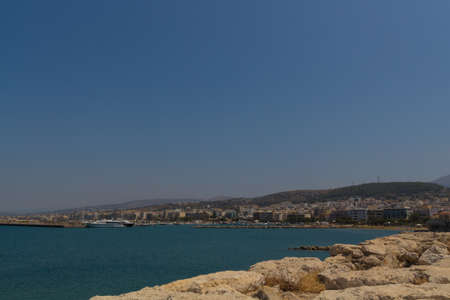 Rethymno, Greece - July  30, 2016:  Panoramic view to Rethymno from the Venetian harbour. Rethymno is a city of approximately 40,000 people in Greece, the capital of Rethymno regional unit on the island of Crete.のeditorial素材