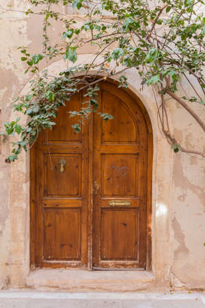 Rethymno, Greece - July  30, 2016:  Old archway portal. The old town of Rethymnon is one of the best-preserved towns of the Renaissance.のeditorial素材