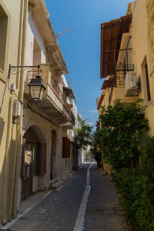 Rethymno, Greece - August  4, 2016: Narrow venetian street on old town. The old town of Rethymnon is...