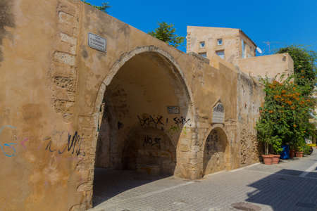 Rethymno, Greece - August  4, 2016: Ancient archway with ottoman plate on it.のeditorial素材