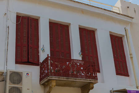 Rethymno, Greece - August  5, 2016:  Old balcony and windows. The old town of Rethymnon is one of the best-preserved towns of the Renaissance.のeditorial素材