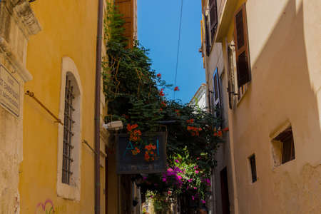 Rethymno, Greece - August  3, 2016: Narrow venetian street in old town. The old town of Rethymnon is...