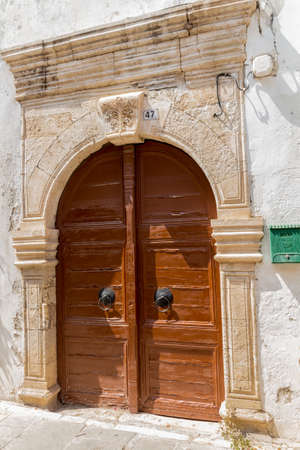 Rethymno, Greece - August  3, 2016:  Ancient archway portal. The old town of Rethymnon is one of the best-preserved towns of the Renaissance.のeditorial素材