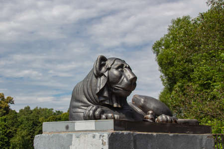 Egyptian sphinx stylized cast-iron sculpture of a lion against a background of a pond, Kuzminsky...