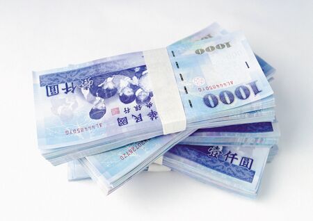 Close-up of stacks of paper currencyの写真素材