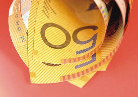 Close-up of a roll of paper currencyの写真素材