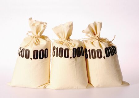 Close-up of sacks of moneyの写真素材