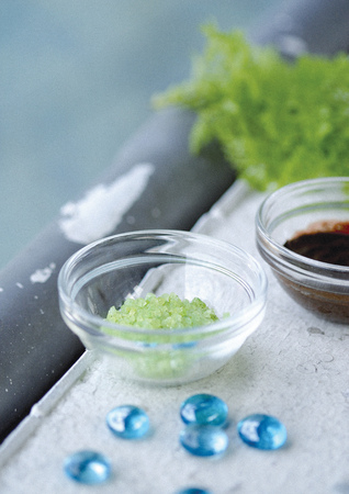 High angle view of crystals of body scrub in a bowl