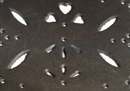 Pattern cut in leather