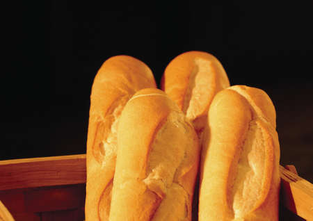 Close-up of four baguettes