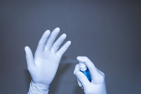 Doctors and nurses Is injecting alcohol gel to kill the virus And clean the gloves At the hospital or lab. Concept of cleaning and virus protection into the human body.の写真素材