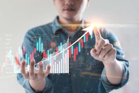 Business people analyze financial data chart trading forex, Investing in stock markets, funds and digital assets, Business finance technology and investment concept, Business finance background.の写真素材