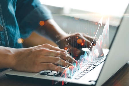 Business people analyze financial data chart trading forex, Investing in stock markets, funds and digital assets, Business finance technology and investment concept, Business finance background.の写真素材