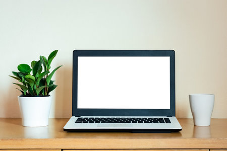 Mockup Copy Space Computer Notebook Laptop Concept , keyboards on laptop computer with balnk copy screen for your advertising content, White screen.の写真素材