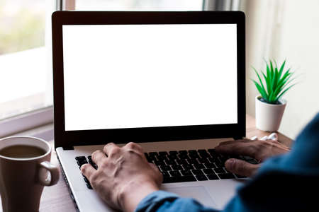Mockup Copy Space Computer Notebook Laptop Concept , keyboards on laptop computer with balnk copy screen for your advertising content, White screen.の写真素材