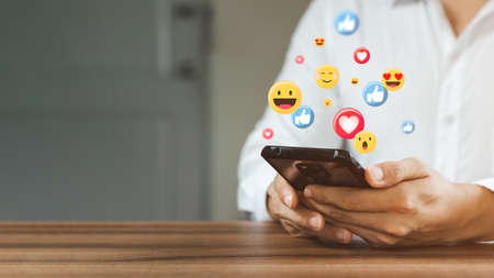 Social Media and Online Digital Concepts, Men Using Smartphones, Ideas for Holiday Life and Social Media, Ideas of Social Disturbance, Working from Home.の写真素材