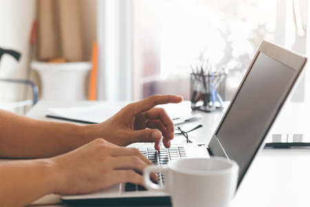 businessmen working at their desks with notebooks taking notes Accepting orders from online customers, online business and e-commerce, Online stores selling products.の写真素材
