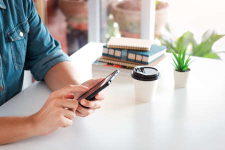 Businessmen use smartphones for business And looking for online sales information, the concept of...