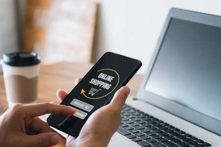 Shopping online, shopping through the applications online in an online store via the smartphone app.の写真素材