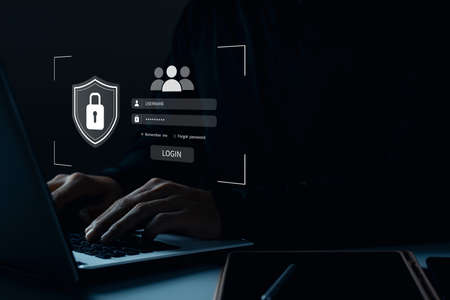 Cybersecurity and privacy concepts to protect data. Lock icon and internet network security technology. Businessmen protecting personal data on tablets and virtual interfaces.の写真素材