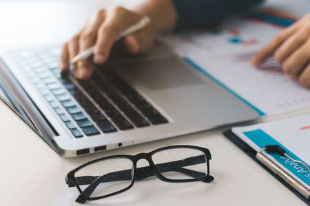 businessman executive analyzing and planning business performance from financial data, analyzing finance data and economic growth graph chart.の写真素材