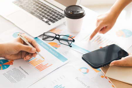 Business Consulting Team Analyzing the company's balance sheet financial statements Working with document graphs, conceptual images for stock markets and investments.の写真素材