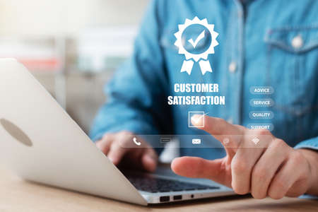 User give rating to service experience on online application, Customer review satisfaction feedback survey concept, Customer can evaluate quality of service leading to reputation ranking of business.の写真素材