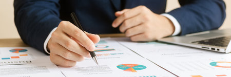 Businessmen and analysts conduct company financial audits, growth and investment chart analysis,...