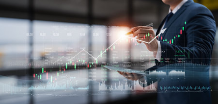 Businessman drawing data growth chart, investment graph on business network and risk analysis, banking and stock market on office background, achieving business investment goals in global economy.の写真素材