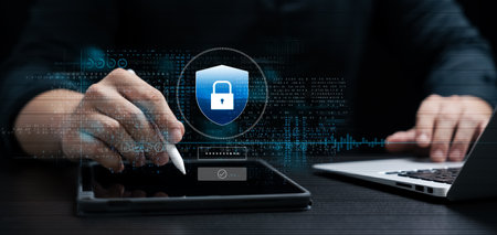 Cyber security and data protection, businessman use laptop and tablet Internet network security...