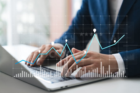 Businessman use laptop and tablet analyzing company growth, future business growth arrow graph, development to achieve goals, business outlook, financial data for long term investment.の写真素材
