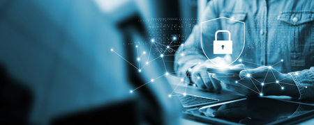 Cybersecurity data protection, businessman using laptop and smartphone internet network security,...