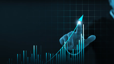 Businessman drawing growth graph, stock market profit growth analysis from investing in global business, financial analysis, economic data analysis, financial management strategy and planning.の写真素材