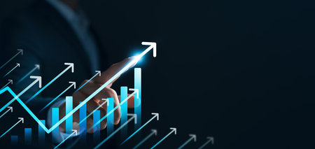 Businessman touching chart graph with up arrow sign, business growth chart, finance and investment, data analysis of company growth and global economy, strategy development to achieve goal.の写真素材